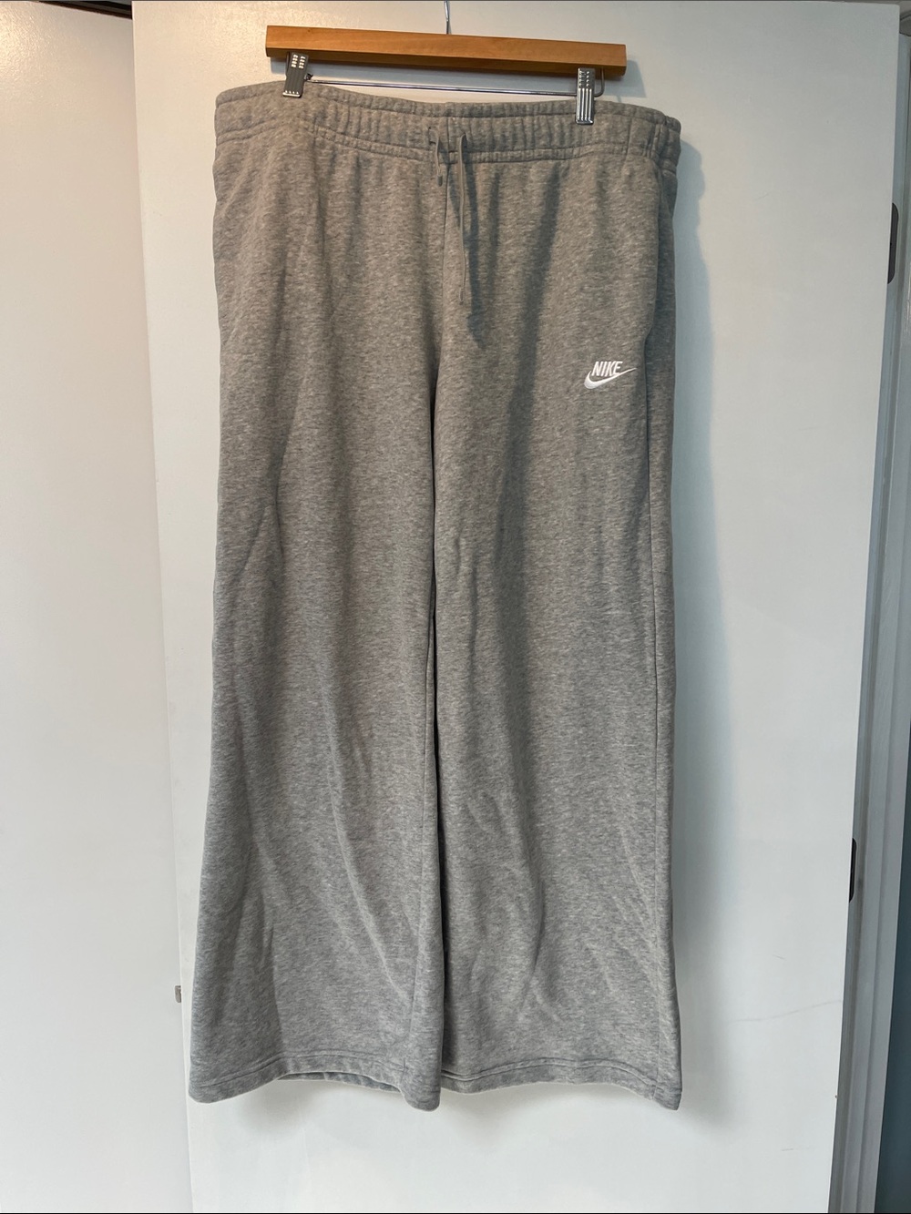 Nike Gray Wide-Leg Sweatpants with White Swoosh Logo